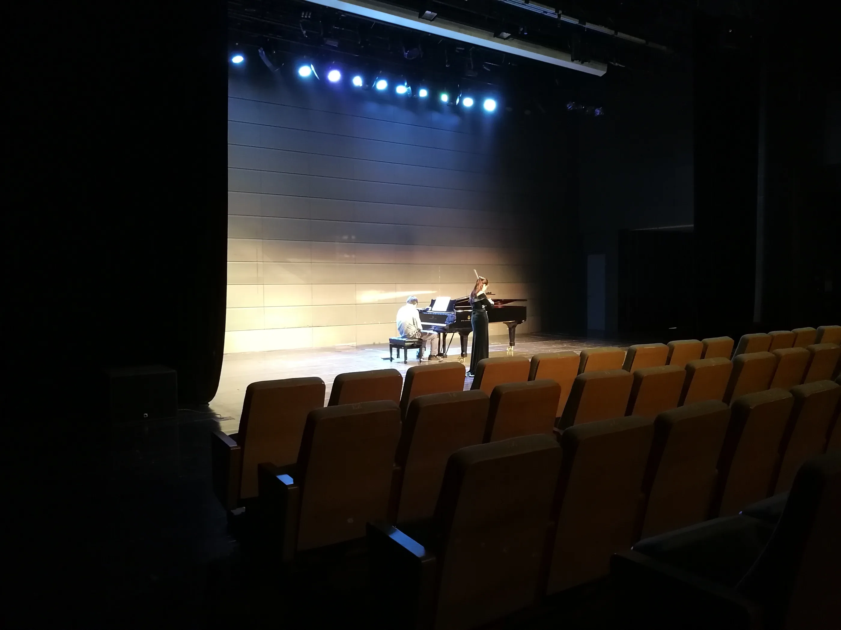 Piano rehearsal viewed from the theatre auditorium